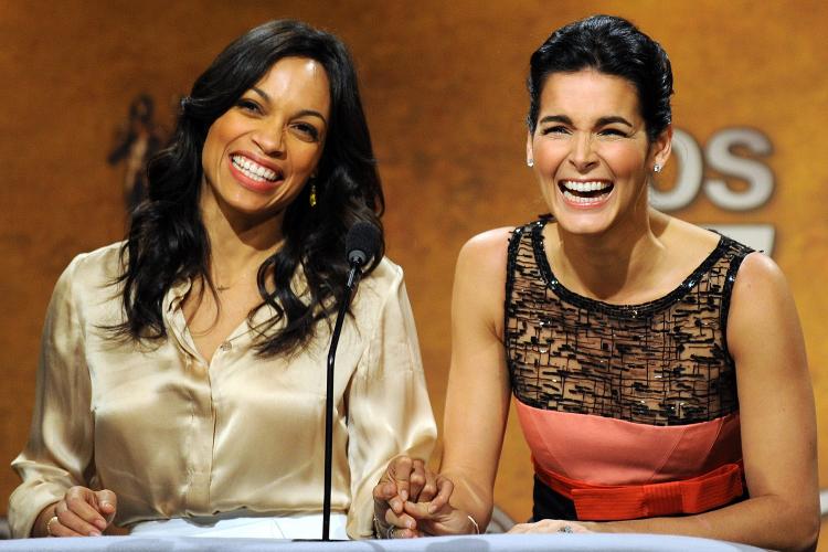 Angie Harmon (R) and fellow actress Rosario Dawson attend the 17th annual Screen Actors Guild Award nominations at the Pacific Design CenterSilverScreen Theater on Dec. 16 in Los Angeles, California. (GABRIEL BOUYS/AFP/Getty Images)