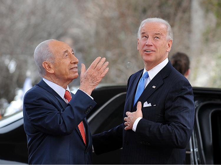 FRIENDSHIP: Israeli President Shimon Peres (R) meets with visiting U.S.-Vice President Joe Biden at the Israeli prime minister's residence on March 9 in Jerusalem. (Yin Bogu/Getty Images)