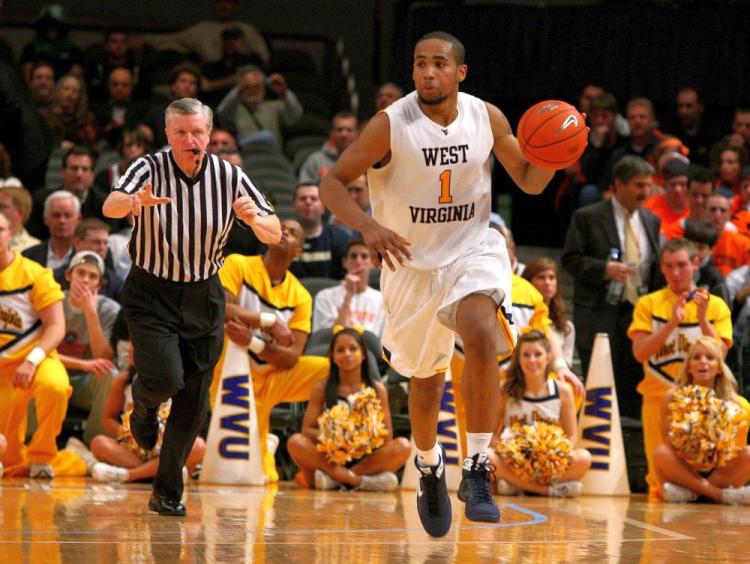 Da'Sean Butler scores 18 points to lead West Virginia in 'The Backyard Brawl.' (Jim McIsaac/Getty Images )