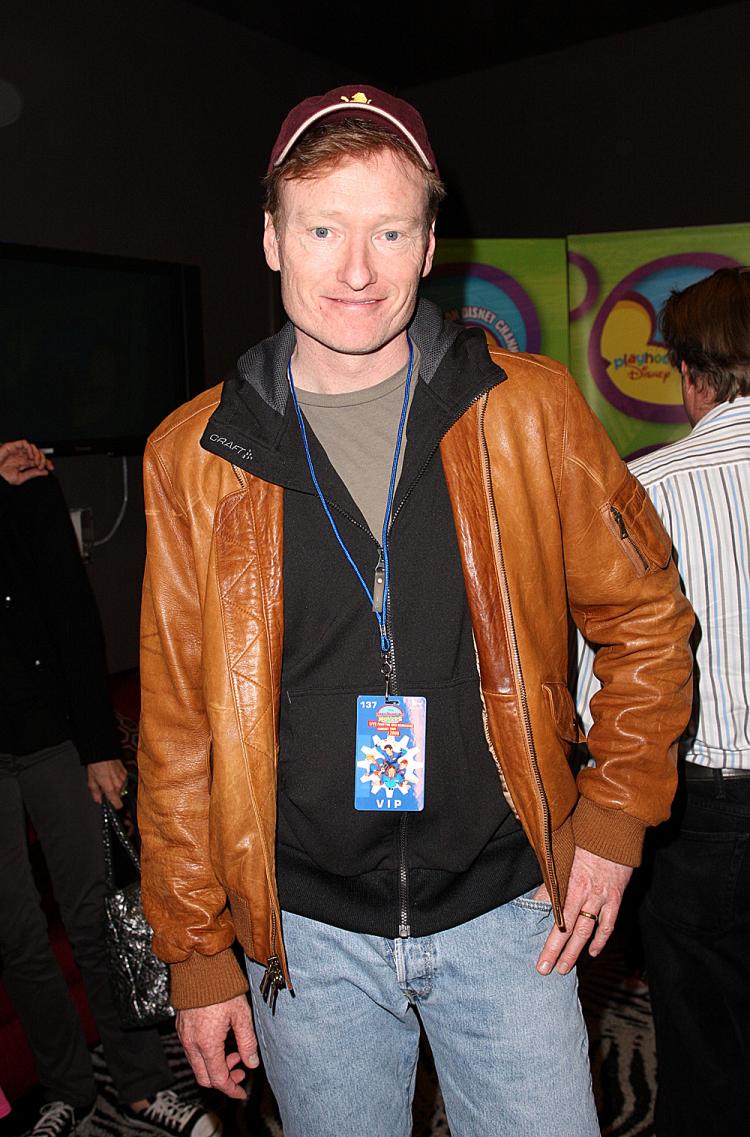 TV Personality Conan O'Brien with Disney's Imagination Movers in Los Angeles during their first ever US concert tour at Club Nokia on December 5, 2009 in Los Angeles, California. (Frederick M. Brown/Getty Images for Disney)