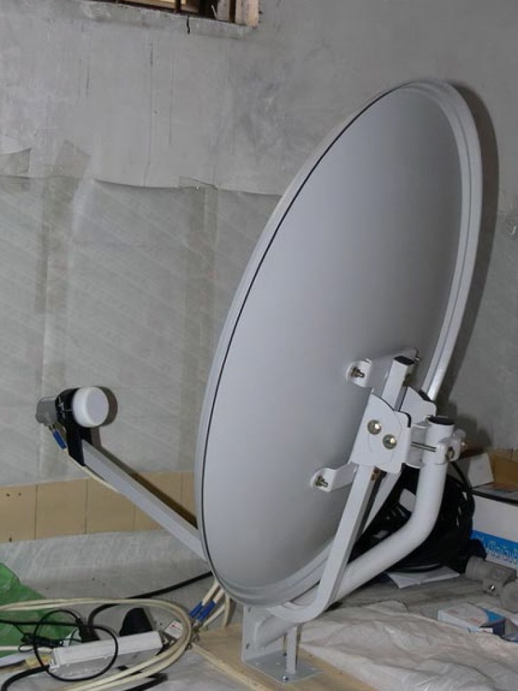 'LITTLE EAR': A satellite dish out of the box and ready to be installed. 'Little Ears' satellite dishes are used to receive the signal of independent TV station New Tang Dynasty TV inside China.  (Minghui.org)