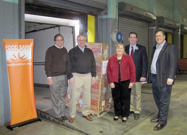 (L to R) Paul Sauder of SauderÃ�Â¢Ã¯Â¿Â½Ã¯Â¿Â½s Eggs, Jerry Kil of Moark LLC, Joanne Ivy of American Egg Board, David Grossnickle of Food Bank for NYC, and Ken Pauze of Moark LLC. (Courtesy of the Food Bank for New York City)