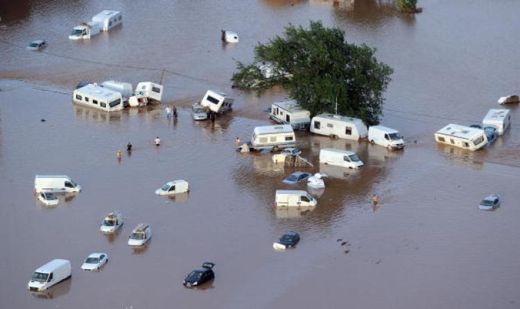 An aerial view taken on June 16, 2010 in the French southeastern city of Puget-sur-Argens shows caravans and cars among water in the aftermath of flooding in this area.  (Gerard Julien/AFP/Getty Images)