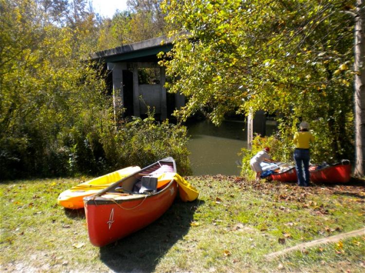 Canoes sit near the banks of the Chattahoochee River before the Trust for Public Land's Paddling Press Conference on Oct. 15 in Cleveland, Ga. (Mary Silver/The Epoch Times)