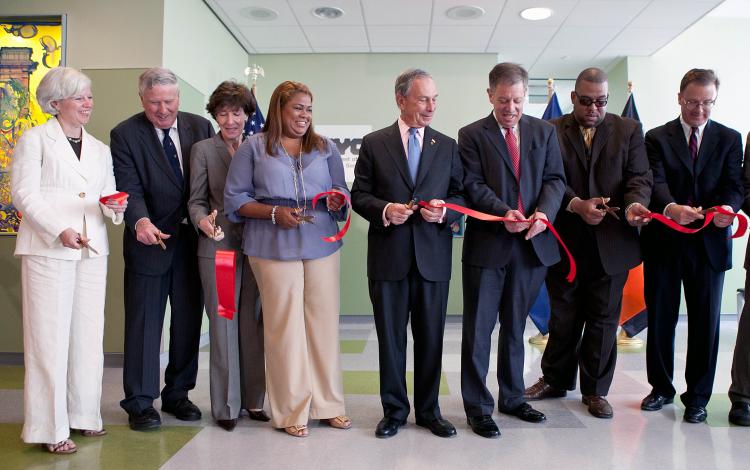 RIBBON CUTTING: Mayor Michael Bloomberg and other city officials opened a new homeless service center, the Prevention, Assistance and Temporary Housing (PATH) facility, in the Bronx on Wednesday.  (Amal Chen/The Epoch Times)