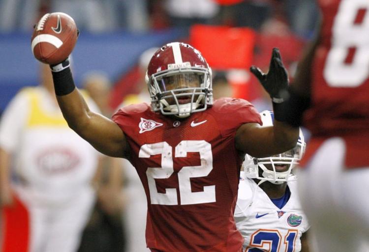 Mark Ingram of the Alabama Crimson Tide takes aim at the Texas Longhorns in the BCS National Championship game. (Kevin C. Cox/Getty Images)