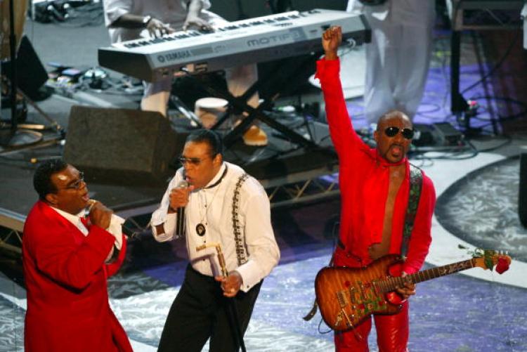 Ron, Rudolf and Ernie Isley of the Musical Group The Isley Brothers perform on stage at the 2004 Black Entertainment Awards held at the Kodak Theatre. Marvin Isley died June 7 at age 56. (Kevin Winter/Getty Images)