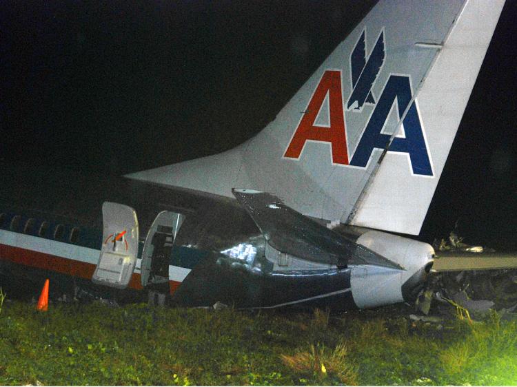 An American Airlines jet is seen after overshooting the runway at Norman Manley International Airport in Kingston, Jamaica on December 22, 2009. (Anthony Foster/AFP/Getty Images)