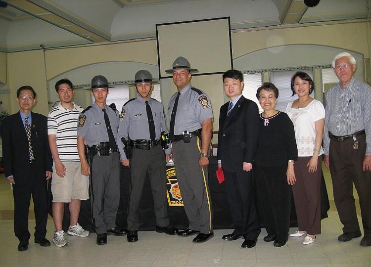 Event attendees including Lt. Col Brown, Han Pan, Shaoying Lin, and several Asian community leaders.  (Epoch Times Staff)