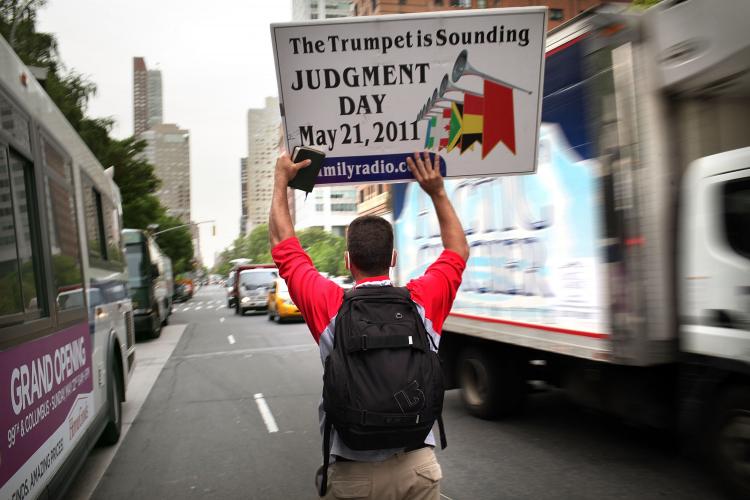 Participants in a movement that is proselytizing that the world will end this May 21, Judgment Day, walk through New York City. (Spencer Platt/Getty Images)