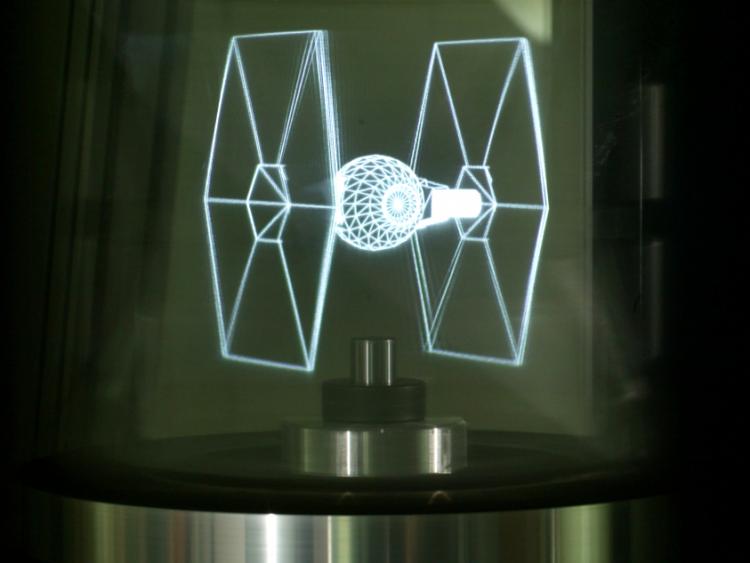 A hologram of a Star Wars fighter plane projected using 3-D technology from the Graphics Lab at the University of Southern California. (Courtesy of the Graphics Lab)