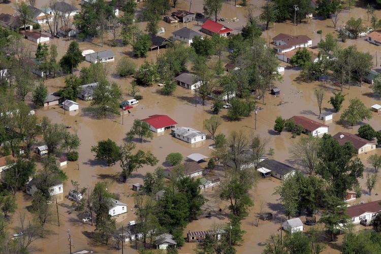 Floodwater surrounds homes in Morehouse, Missouri on May 3. Heavy rains have left the ground saturated, rivers swollen, and has caused widespread flooding in Missouri, Tennessee, Illinois, Kentucky and Arkansas. (Scott Olson/Getty Images)