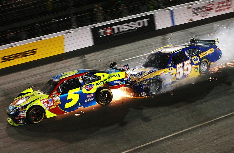 JUST RACING?: Michael Waltrip rams Casey Mears during the NASCAR Dan Lowry 400 at Richmond International Raceway on May 3, 2008. (Doug Benc/Getty Images)