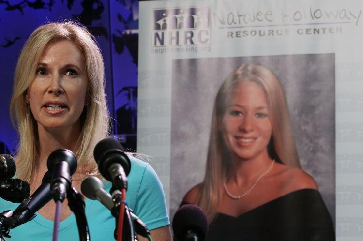 Natalee Holloway's DNA does not match that of a bone that was recently discovered on Aruba, officials say. Pictured above, her mother Beth Holloway participates in the launch of the Natalee Holloway Resource Center on June 8, 2010 in Washington, DC. (Mark Wilson/Getty Images)