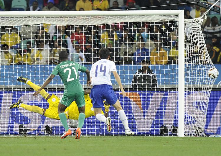 Goalkeeper Vincent Enyeama misses (yellow) a goal by striker Park Chu-Young (unseen) during the Nigeria&$8211Korea Group B first-round World Cup match. (Javier Soriano/AFP/Getty Images)