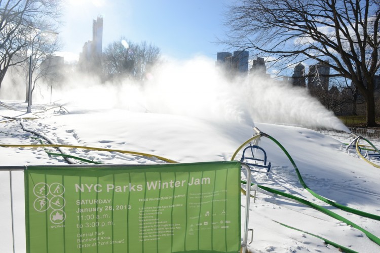 Snowmaking guns blast out fresh snow onto the Central Park lawn on Jan. 22 in preparation for Winter Jam NYC, a winter sports festival. (Courtesy of New York Parks Department)
