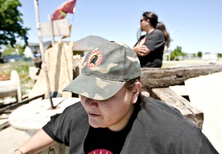 Native protesters 'Hot Wheelz' (C), and 'Runs through Fire' occupy a housing development in Caledonia, Ontario. Poverty among Canadaâ��s aboriginal population has led to an increasing problem with gangs. (Geoff Robbins/AFP/Getty Images)