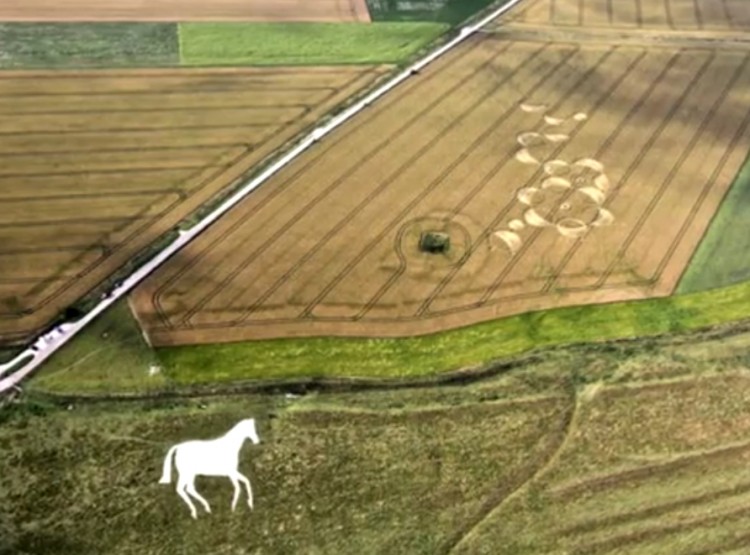 YouTube screenshot of a line of circles at Roundway Hill in Wiltshire on July 23. The formation is near a new white horse that was carved into the hillside in 1999 to celebrate the new millennium. (The Epoch Times)