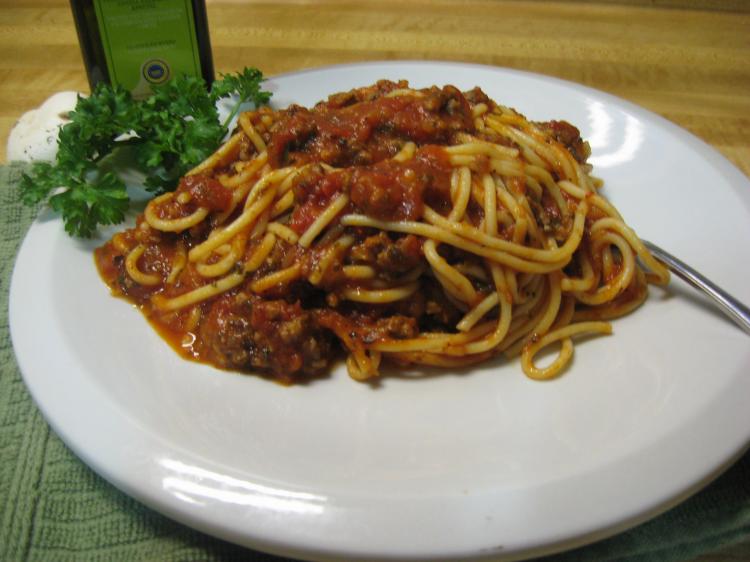 SIMPLE: The celery and onion blend gives this spaghetti sauce a hearty flavor. (Maureen Zebian/The Epoch Times)