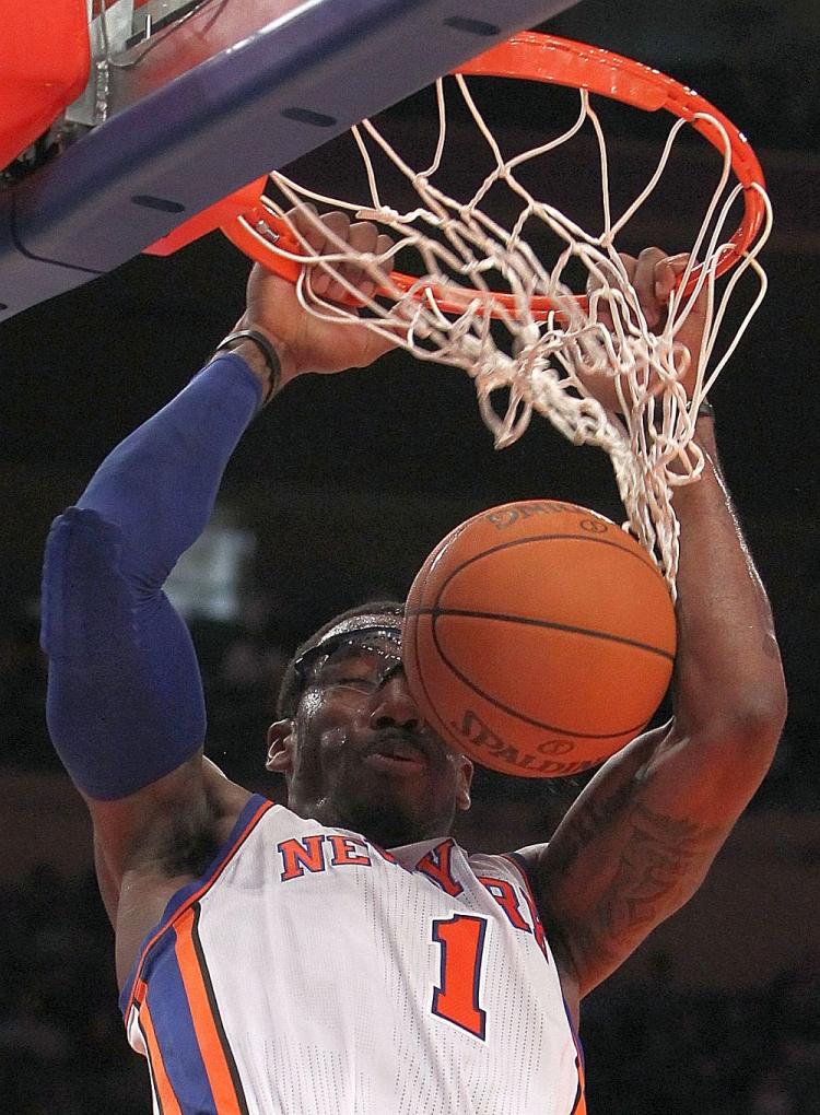 Amar'e Stoudemire's 30 points lifted the New York Knicks over the Denver Nuggets on Sunday. (Nick Laham/Getty Images)