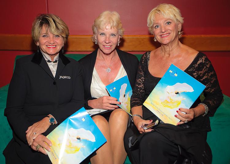 Wanda Lee Panetta, L; Loretta Franchini, C; and Deanna Pedrini, R. The three friends, who have varied backgrounds that include ballet, fashion design, and world travel, enjoy Shen Yun at the Broward Center in Fort Lauderdale, Fla. (The Epoch Times)