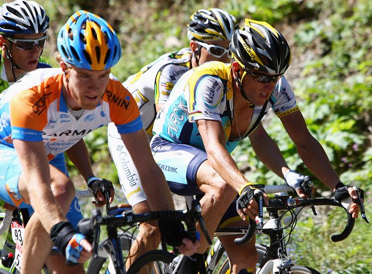 Lance Armstrong (R) and Tyler Farrar ride in Stage Fifteen of the 2009 Tour de France. Monday is a rest day; Teusday opens in the French Alps. (Bryn Lennon/Getty Images)