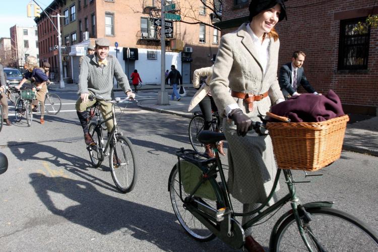 TALLY HO: Recapturing the aura of early 20th century Britain, Darren and Lori Milnes rooted through their closet to put together old-fashioned riding outfits for the Big Apple Tweed Ride. (Tara MacIsaac/The Epoch Times)