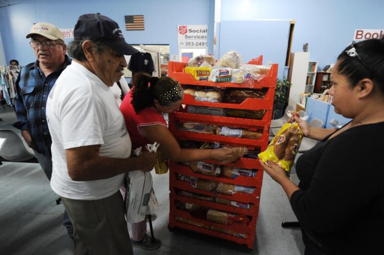 Unemployment extension: Unemployed people receive bread handouts from The Salvation Army in the southern Californian town of El Centro, a town of 50,000 people where 30.4 percent of the work-age population are without employment, on October 28, 2010. (Mark Ralston/AFP/Getty Images)