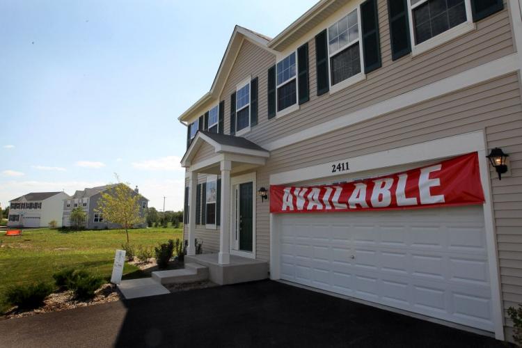 A home is offered for sale in Wauconda, Illinois. The U.S. housing market is expected to lose $1.7 trillion in market value in 2010 (Scott Olson/Getty Images)