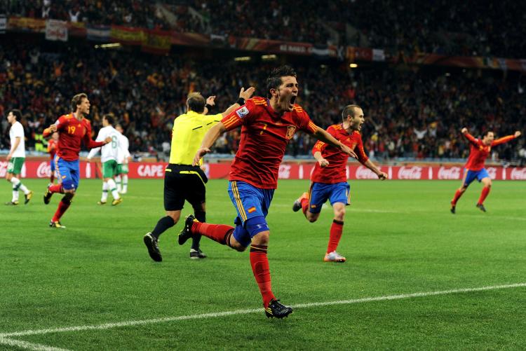 David Villa rejoices after finishing off some excellent Spanish teamwork.  (Jasper Juinen/Getty Images)