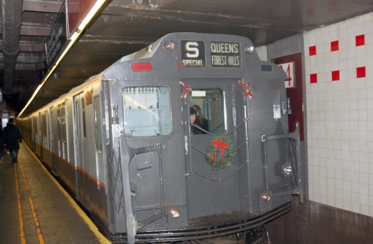 SUBWAY OLDEN DAYS: The MTA brings out the antiques as a holiday wonder. Straphangers experience New York of the 1930s through the 1970s. (Tara MacIsaac/The Epoch Times)