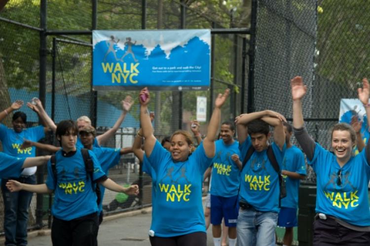 Students walk in Chelsea Park as part of Walk NYC on Monday.  (Angela Wang/The Epoch Times)