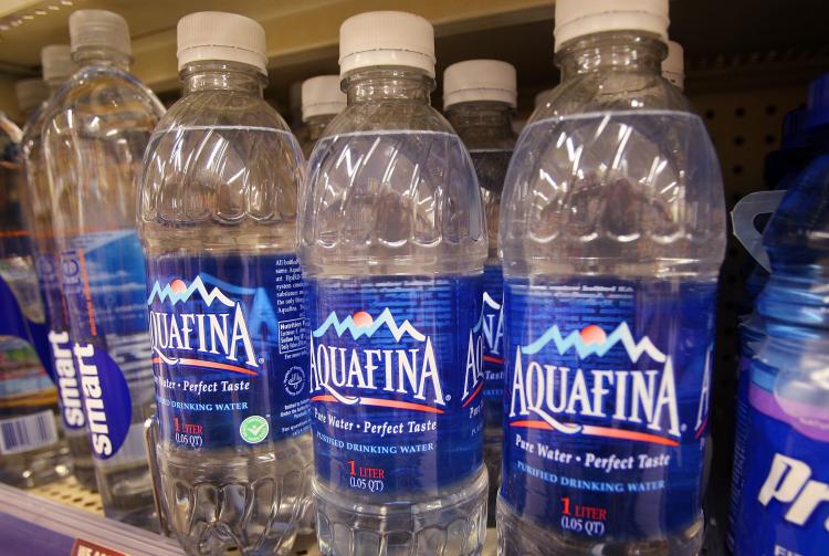 An 82-year-old women has succeeded to put a ban on bottled water a small town in MA. Jean Hill protested that environmentally, plastic bottles from bottled water filling up landfills. (Scott Olson/Getty Images)