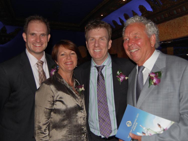 Qantas representative, Andrew Rattle (2nd R) with Kim Blickling and friends at the majestic Capitol Theatre on Tuesday, Feb. 8. (Shar Adams/The Epoch Times)