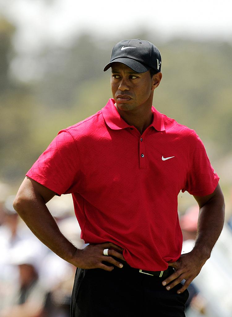 Tiger Woods is just the latest in a long list of sports stars behaving badly. (Mark Dadswell/Getty Images)