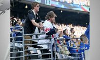 Saints Fan Helps Disabled Giants Fan Stand for National Anthem Before Game