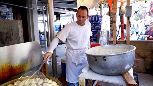 Danny Fratta making zeppoles at his stand