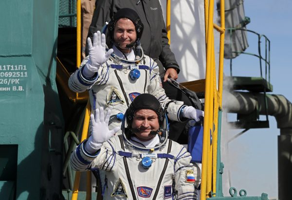 International Space crew board Soyuz