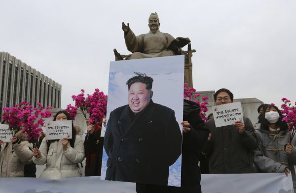 a portrait of North Korean leader Kim Jong Un during a rally to welcome his possible visit to South Korea