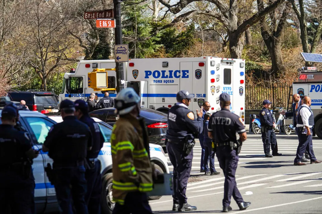 New York Police Department Counterterrorism officers respond to a suspicious package report in Carl Schurz Park, which borders Gracie Mansion in New York City on March 10, 2026. Two suspects, Emir Balat and Ibrahim Kayumi of Pennsylvania, were arrested on March 7 for throwing hand-made explosive devices that did not explode during a right-wing, anti-Islamic protest outside Gracie Mansion, the residence of New York City Mayor Zohran Mamdani. (Ryan Murphy/Getty Images)