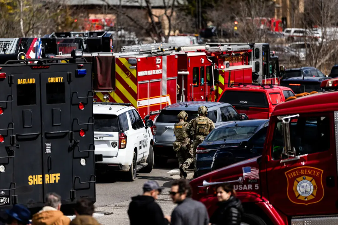 Law enforcement respond near Temple Israel following reports of an active shooter in West Bloomfield, Mich., on March 12, 2026. (Emily Elconin/Getty Images)
