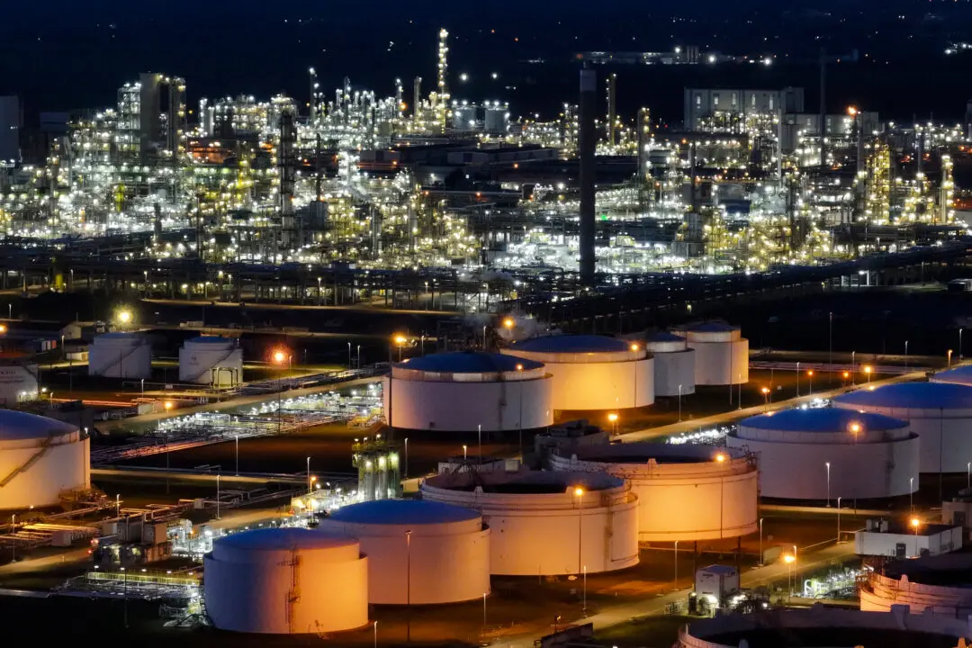 LEUNA, GERMANY - MARCH 17: In this aerial view the Leuna industrial chemical park stands illuminated at twilight on March 17, 2026 in Leuna, Germany. The Leuna facility depends on petroleum and natural gas, the prices of which for both have risen dramatically since the outbreak of the U.S.-Israeli conflict with Iran. The chemical industry in Germany was already under severe stress, with current output well below capacity. The Leuna park includes a TotalEnergies oil refinery and a Dow polyethylene plant, among many other chemicals products producers. (Photo by Sean Gallup/Getty Images)