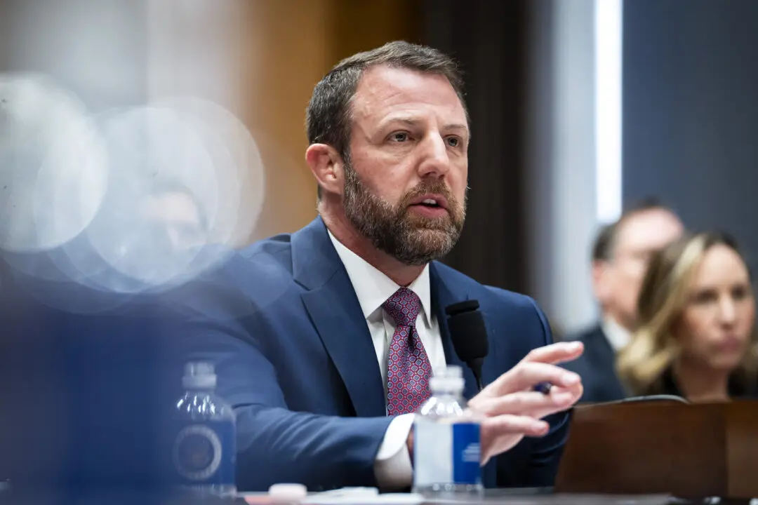 Sen. Markwayne Mullin (R-Okla.) testifies during his confirmation hearing to lead the Department of Homeland Security on Capitol Hill in Washington on March 18, 2026.(Madalina Kilroy/The Epoch Times)