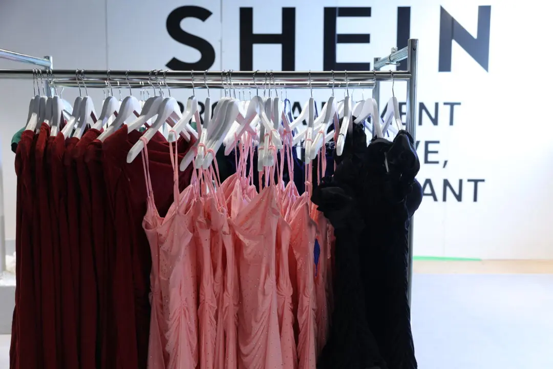 This photograph shows the logo of the Asian e-commerce giant Shein displayed at the Bazar de l'Hotel de Ville (BHV) department store in Paris on March 19, 2026. A French appeals court on March 19, 2026 rejected the government's demand to temporarily suspend a section of Shein's website in France after the discovery that it was selling illicit products like childlike sex dolls, now removed from sale. (Photo by Charlotte SIEMON / AFP via Getty Images)