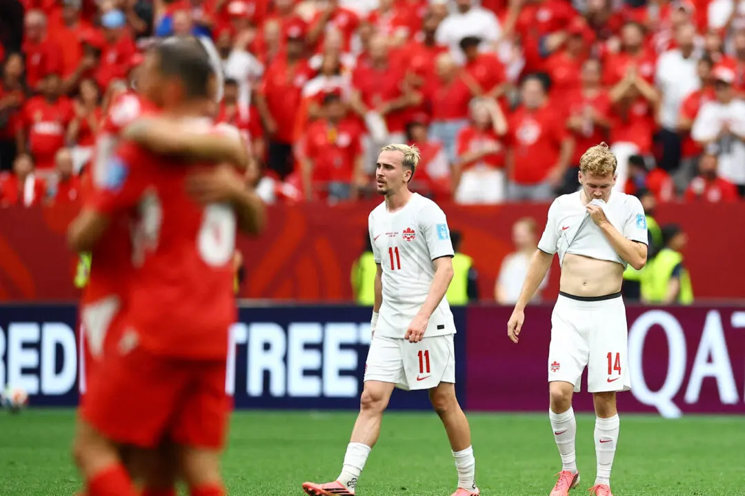 Swiss Top Canada 2–1, Stop Host Nation’s Group-Winning Trifecta