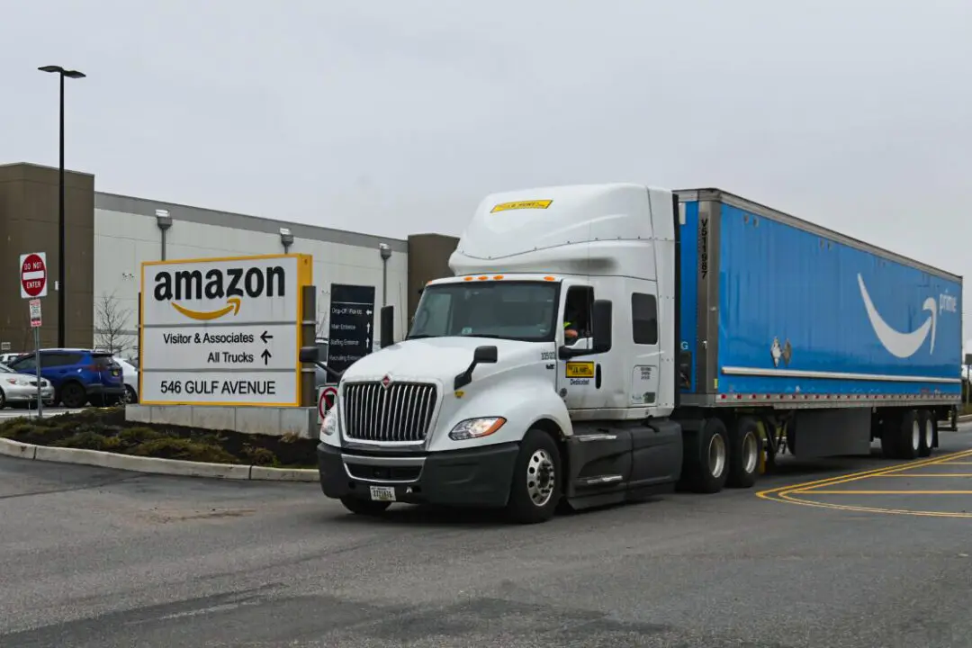 Freight Carrier Shares Fall as Amazon Escalates Logistics Push