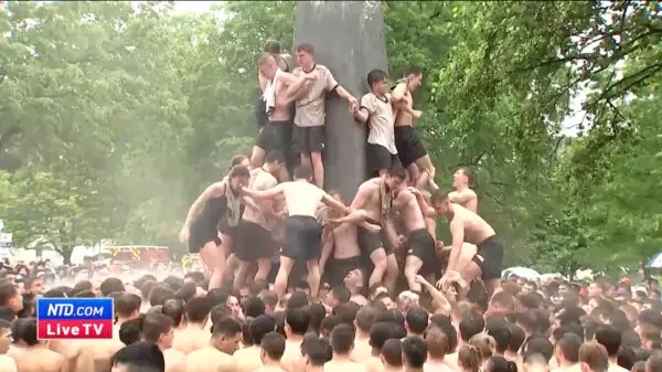 LIVE NOW: US Naval Academy Plebes of 2026 Attempt Annual Greased Climb