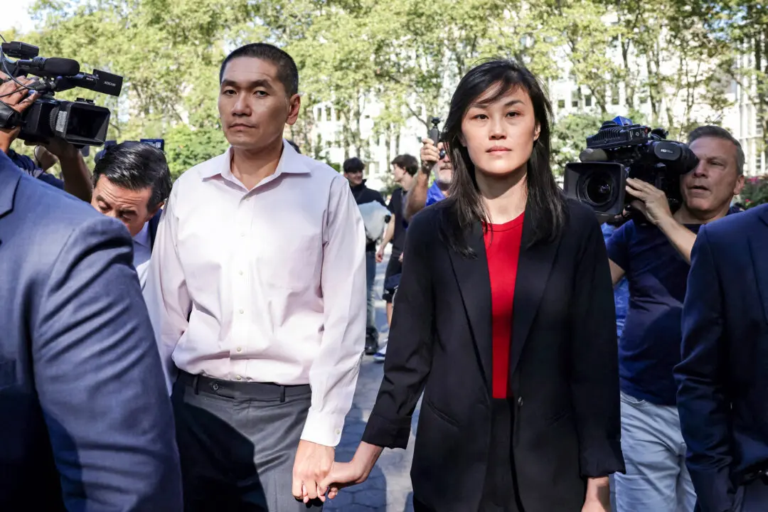 Husband of Ex-New York Governor Aide Recorded Millions in Payments From China, Files Show