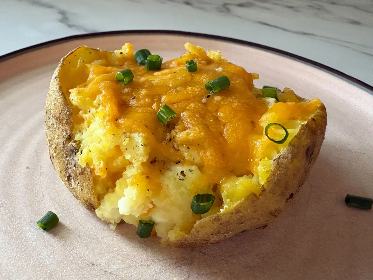 This 1-ingredient Upgrade for Baked Potatoes Makes Them Impossibly Fluffy thumbnail
