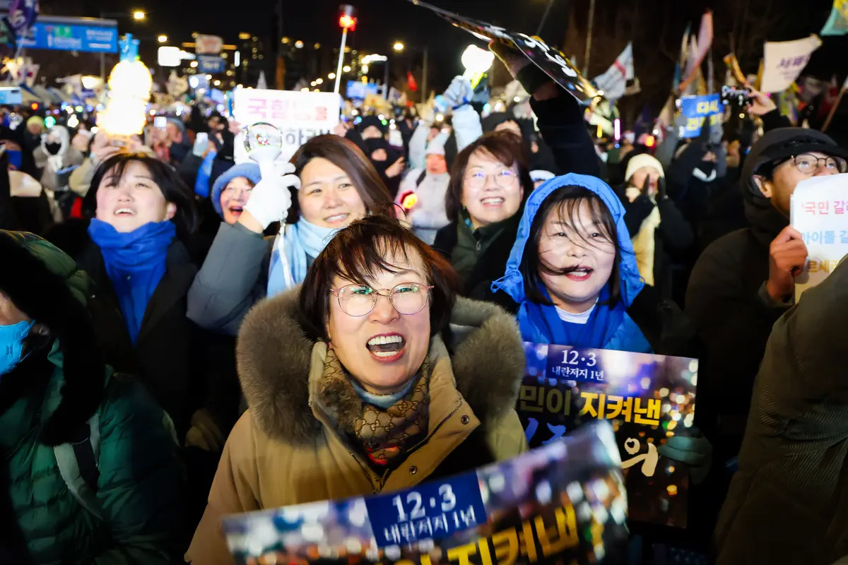 Day in Photos: Anniversary of Martial Law in South Korea, Farmers Protest in Greece, and Big Wave Surfing thumbnail